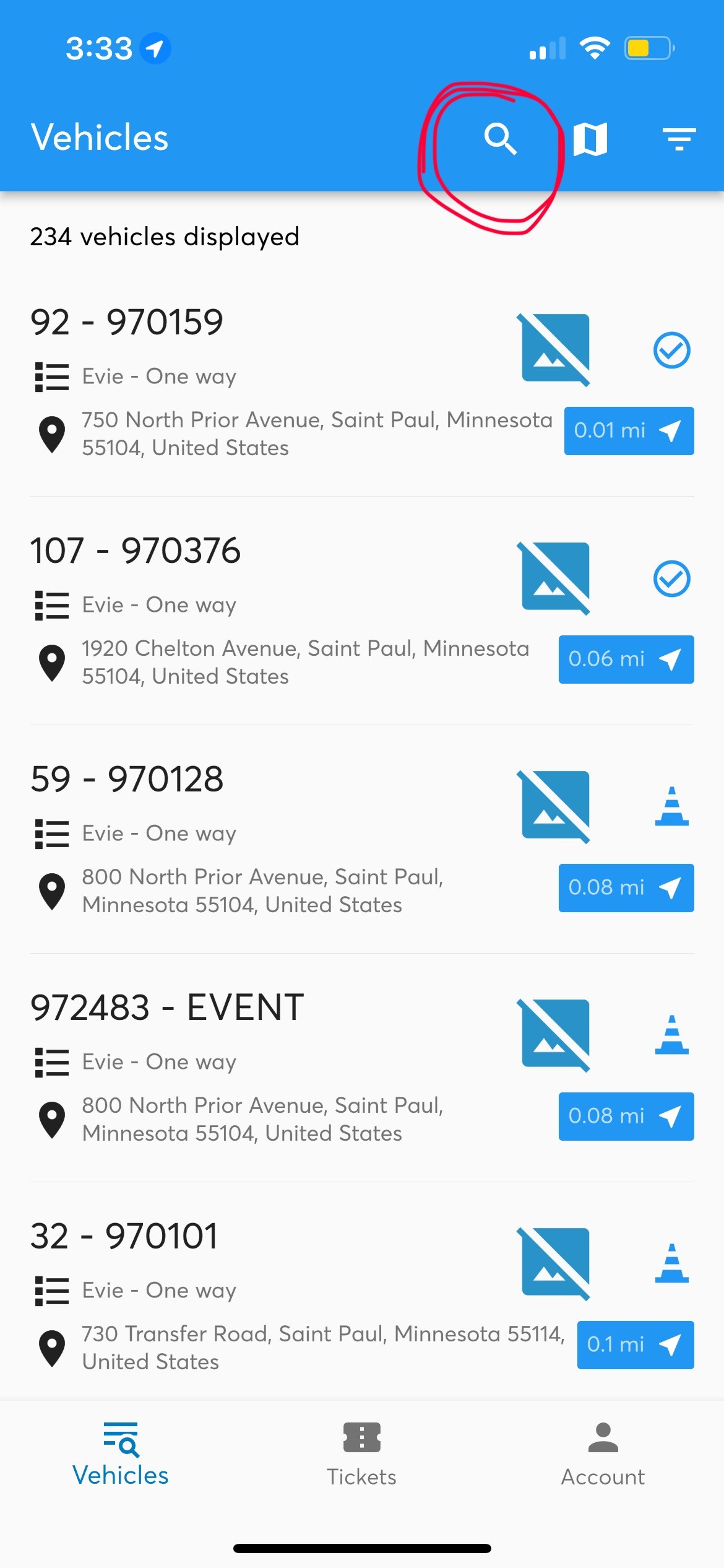 A screenshot of the Vulog app with the search button circled.