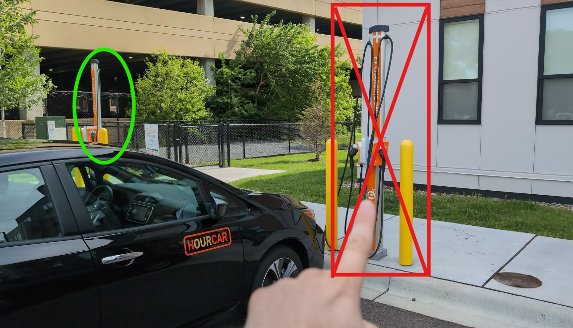 The two charge towers at Blooming Meadows, with the right, non-HOURCAR one crossed out.