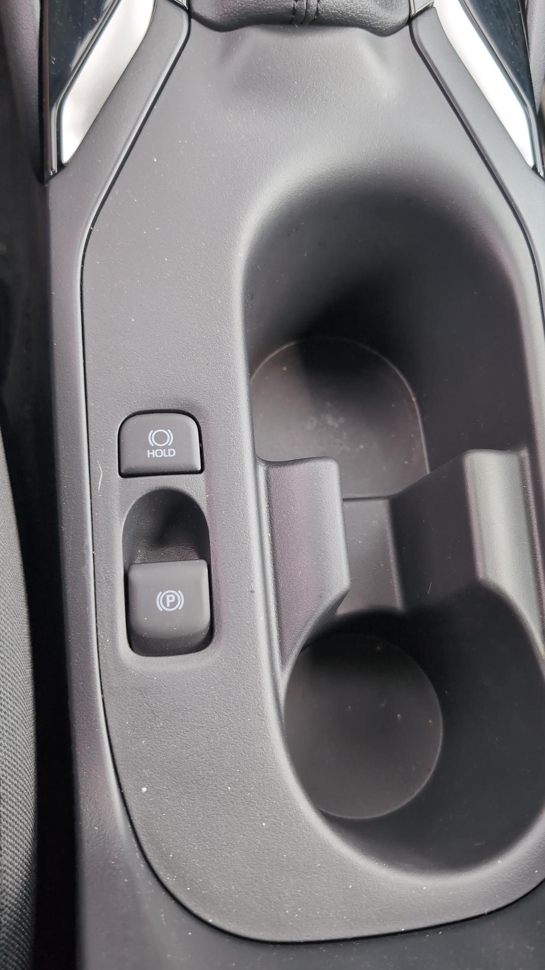 Toyota Corolla Electronic Emergency Brake in the center console of the car
