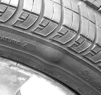 Tire with sidewall bubble